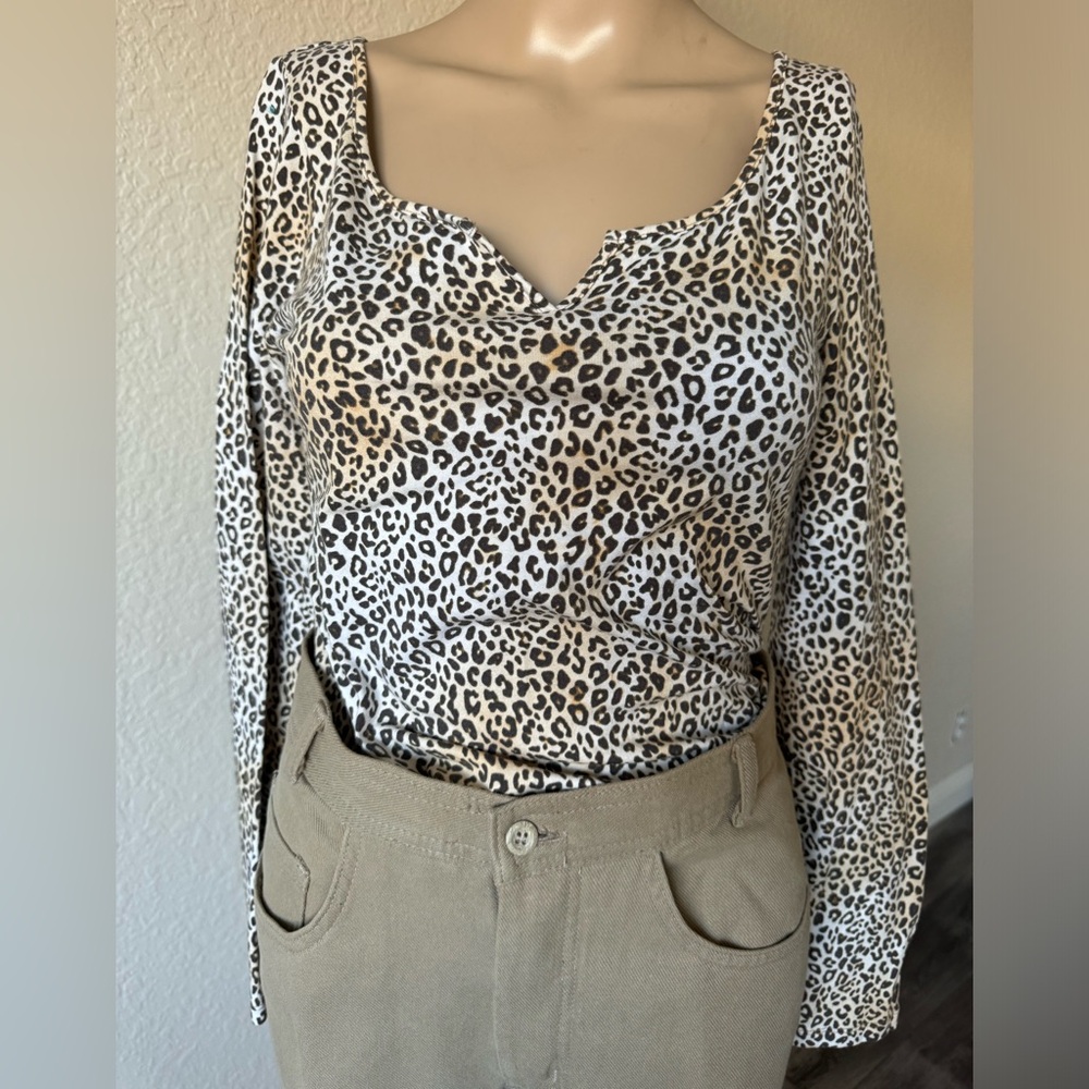 Victoria’s Secret Pink cheetah print long sleeve body suit